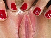 Carli uses her pearl necklace as a sex toy as she partially stuffs it up inside her pussy and slowly pulls it out again.
