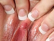 Petite teen teases her swollen pussy with lollipop