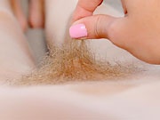 Hairy blonde amateur teen Amanda spreading furry snatch