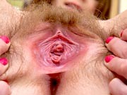 Natural amateur Kattie spreading her hairy pussy wide open