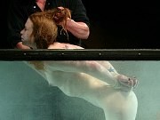 Madison Young hot redhead in bondage gets sprayed and dunked