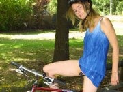 Amateur girl Ginny undressing and posing in the park