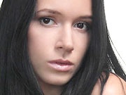 Gorgeous brunette babe Anna posing in softcore erotic photos