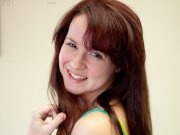 Pretty redhead amateur babe Anna strips and spreads