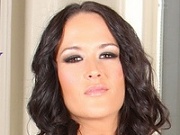 Carbella Bing curvy brunette big breasts & pink pussy bared on a couch