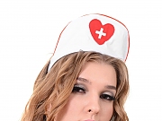 Alina N works herself free from a naughty nurse unfiorm