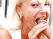 Mature chick sucking cock and getting facial outdoors