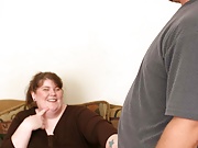 Horny fatty servicing huge cock on the couch