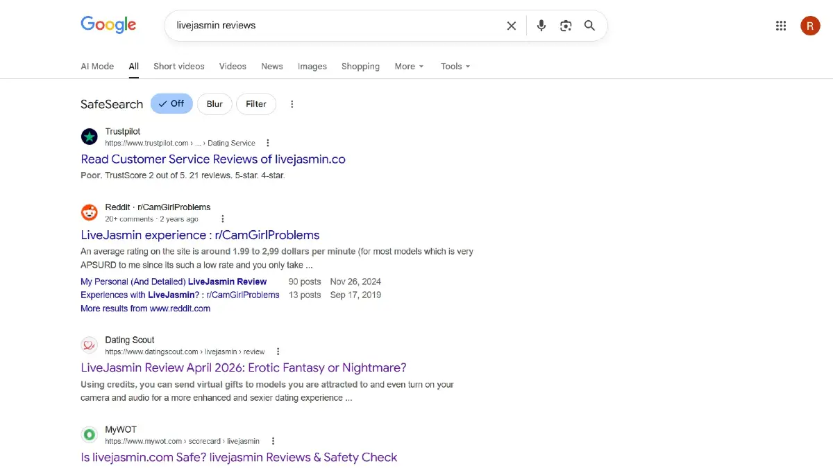 Google search results for LiveJasmin reviews showing Reddit discussions and Trustpilot ratings