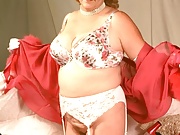 big red hot mama taking off her little panties