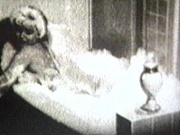 This notorious clip from Celebrity Sex Tapes by Dreamland and K-Beech features Marilyn Monroe posing seductively and playfully in a bubble bath, coyly showing her full, beautiful breasts.