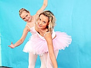 Two blonde teen ballerinas love to use some toys together