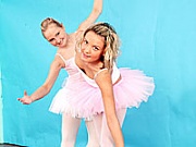 Two blonde teen ballerinas love to use some toys together 