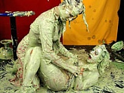Two hot lesbian babes playing with their messy finger paints
