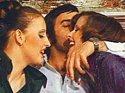 Two hairy seventies girls sharing a big and stiffy cock