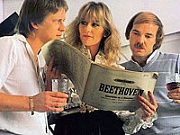 Hairy seventies lady pleases two big horny guys at once 