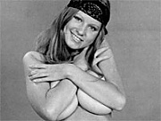 Teenage seventies chick showing her big natural boobies