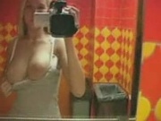 Filthy chick masturbates pussy on the toilet bowl