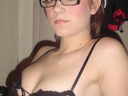 Four eyed chick isnt ashamed to show her boobs on home cam