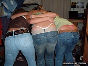 Saucy girls pull tight fitting jeans down