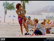 Karyn Parsons takes her amazing bikini body to the beach