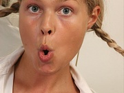 Pigtailed & busty teen Lana strips in her school uniform 