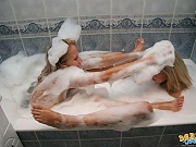 18yo Debbie kissing petite lesbian teen in hot tub