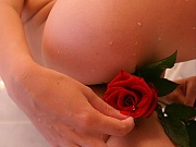 Gorgeous & young teen Debbie posing naked with red rose