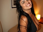 Andria Zammi posing in black bikini her huge natural tits!