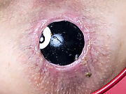 By request I play with billiard balls. All my holes get stuffed by a different billiard ball. See extreme naste close ups of my fleshy asshole pushing out the 8-Ball.