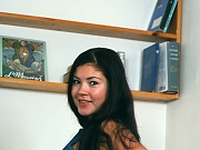 A daring cute teenage schoolgirl masturbates on a chair 
