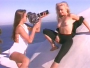 Two retro babes filming their hot sex adventures outside