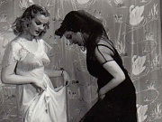 Cute and sexy vintage lesbians undressing in the fifties