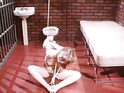 A blonde is tied and tethered in some VERY uncomfortable positions. 