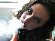 Watch this beauty smoke a cigarette and strip