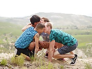 Four horny twink boys fuck bareback in the Spanish forrest.