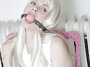 Platinum blonde endures gags, chains, and nipple clamps 