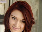 Cute Redhead Alana Rains gets butt naked outdoors. 